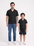 Father and son wearing matching Black Family Cuban Bundle